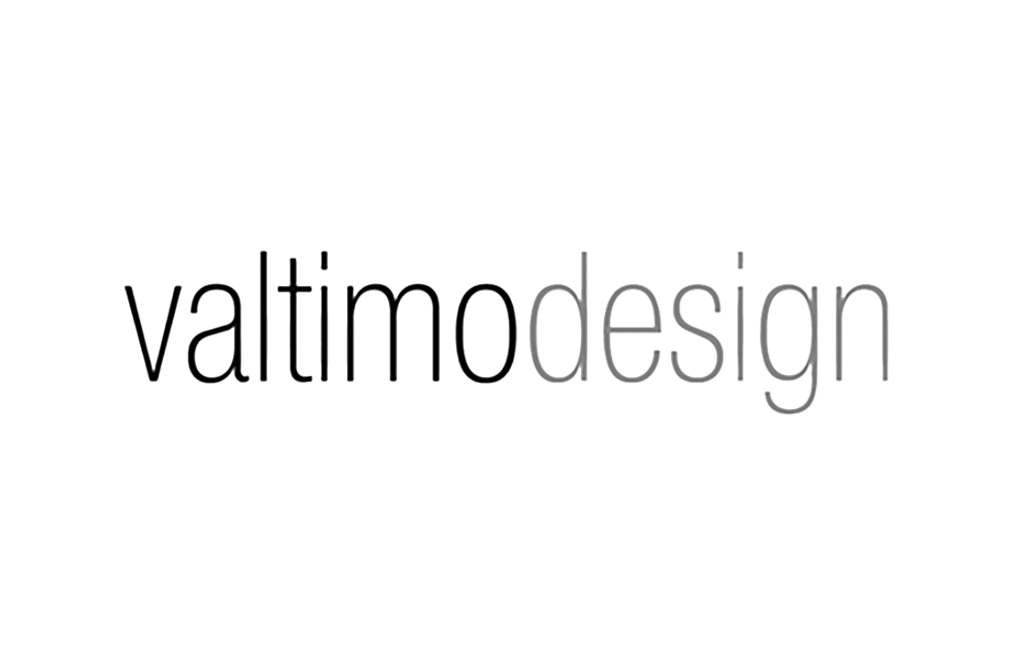 Valtimo Design -yrityksen logo. Logossa on sanat "valtimodesign" yhtenä sanana, pienillä, ohuilla kirjaimilla kirjoitettuna. Sanan "valtimo" kirjaimet ovat mustia, ja sanan "design" kirjaimet ovat tummanharmaita. Logo on valkoisella taustalla.